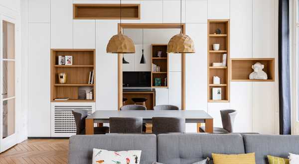 Photo avant - après de la rénovation d'un appartement haussmannien de 230m2 à Strasbourg