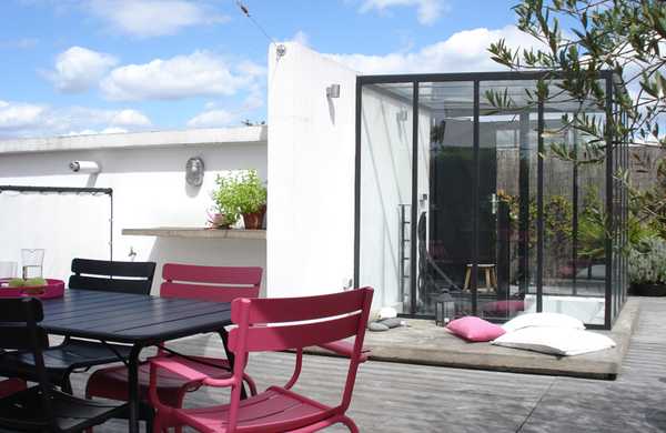 Transformation d'un toit en terrasse végétalisée style Loft par un architece paysagiste à Strasbourg