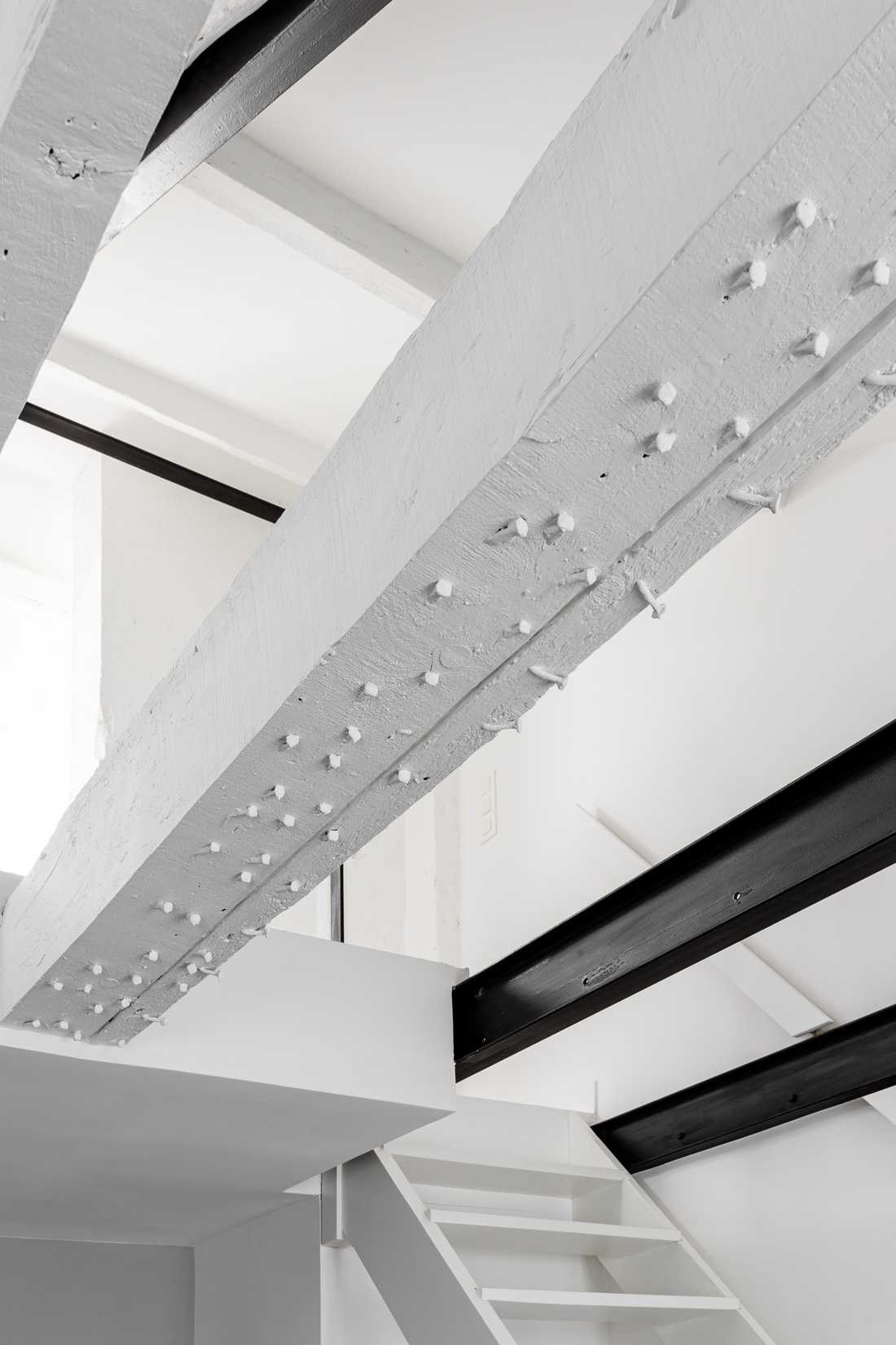 Poutres en ois apparentes dans un duplex à Strasbourg