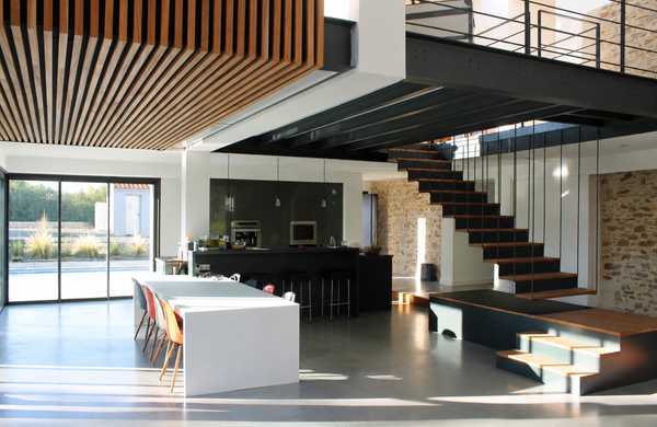 Réhabilitation d'un bâtiment agricole en habitation par un architecte d'intérieur à Strasbourg
